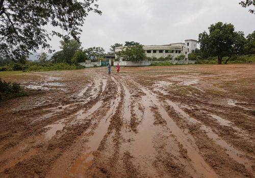 No road to reach the school; female students' futures forced to get stuck in the mud.