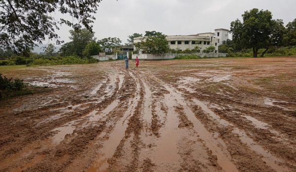 No road to reach the school; female students' futures forced to get stuck in the mud.